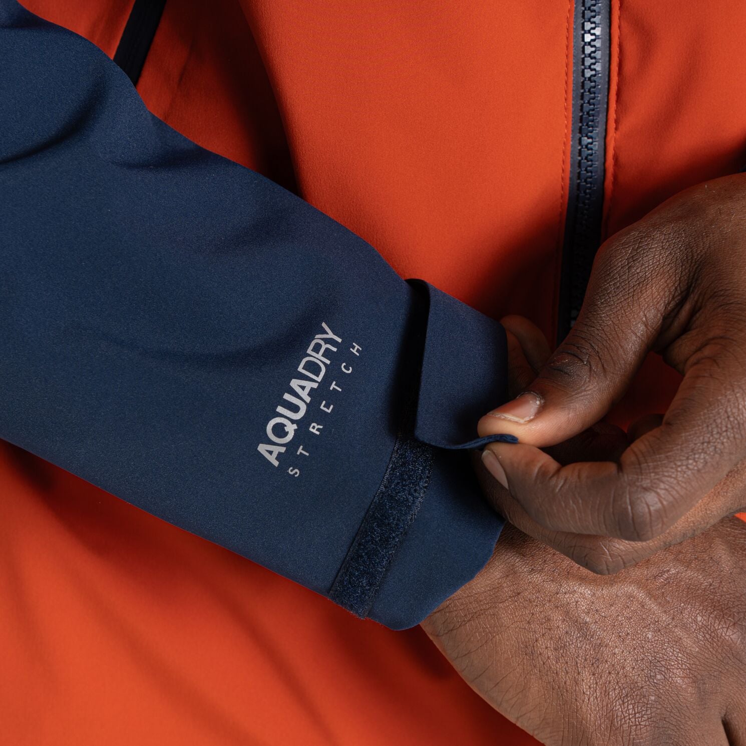 Craghoppers Men's Diggory Stretch Waterproof Jacket  | Blue Navy Carnelian Orange