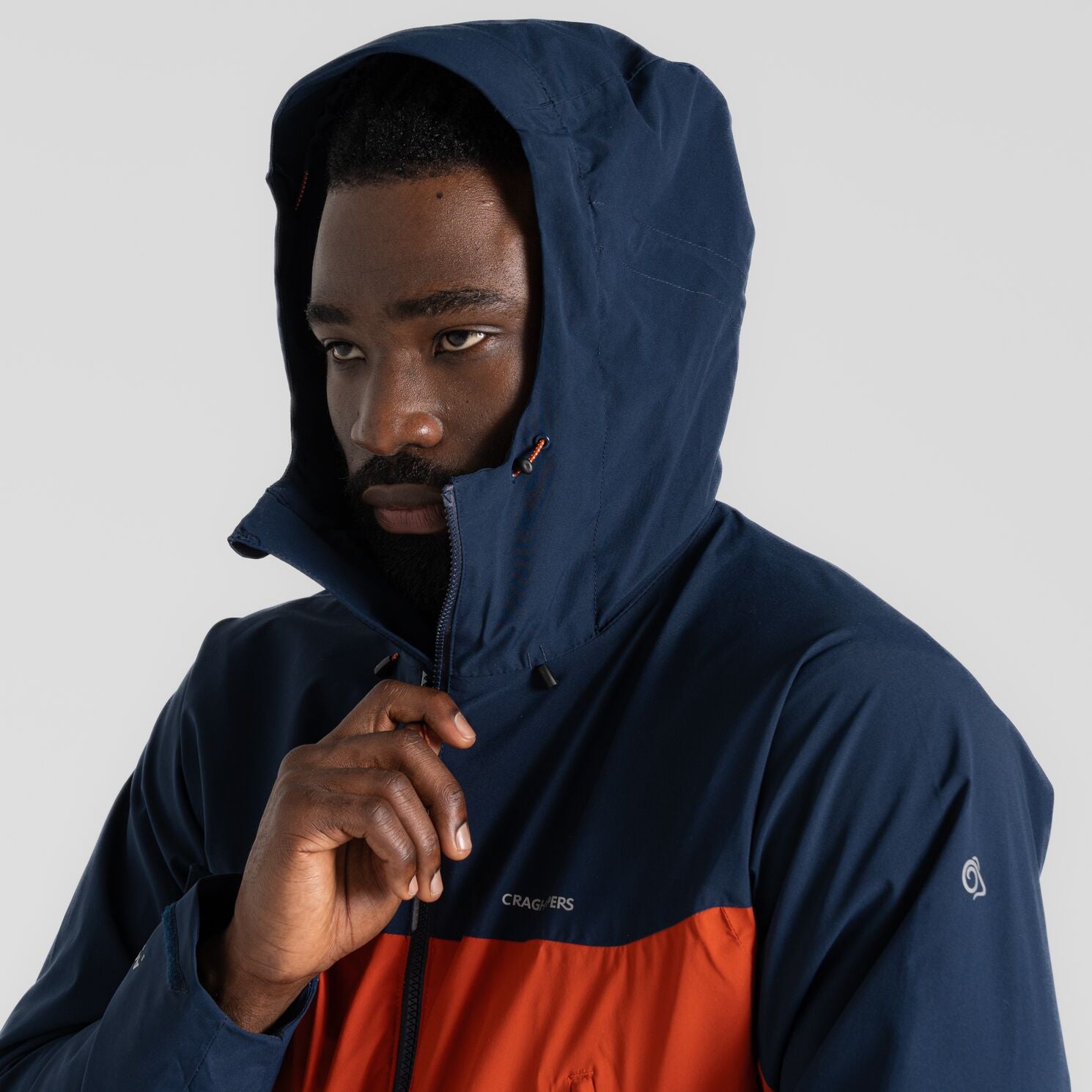 Craghoppers Men's Diggory Stretch Waterproof Jacket  | Blue Navy Carnelian Orange