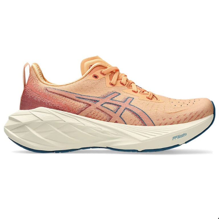 Peach-colored running shoe with a white sole on a white background