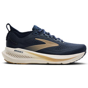 Navy running shoe with white sole on a white background