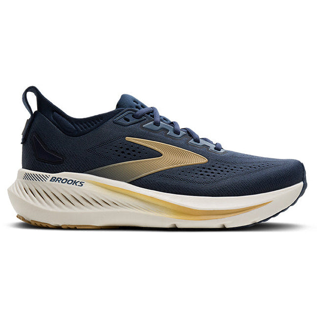 Navy running shoe with gold accents on a white background