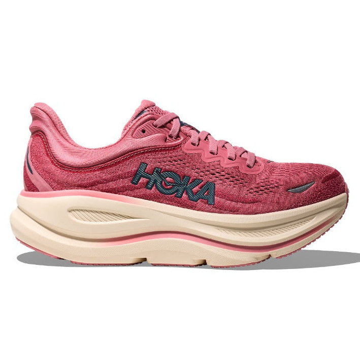 Pink running shoe with 'Hoka' branding on a white background