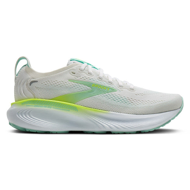 White running shoe with green accents on a white background