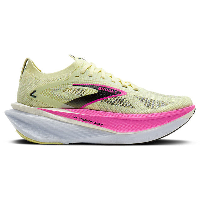 Light green running shoe with pink sole on a white background