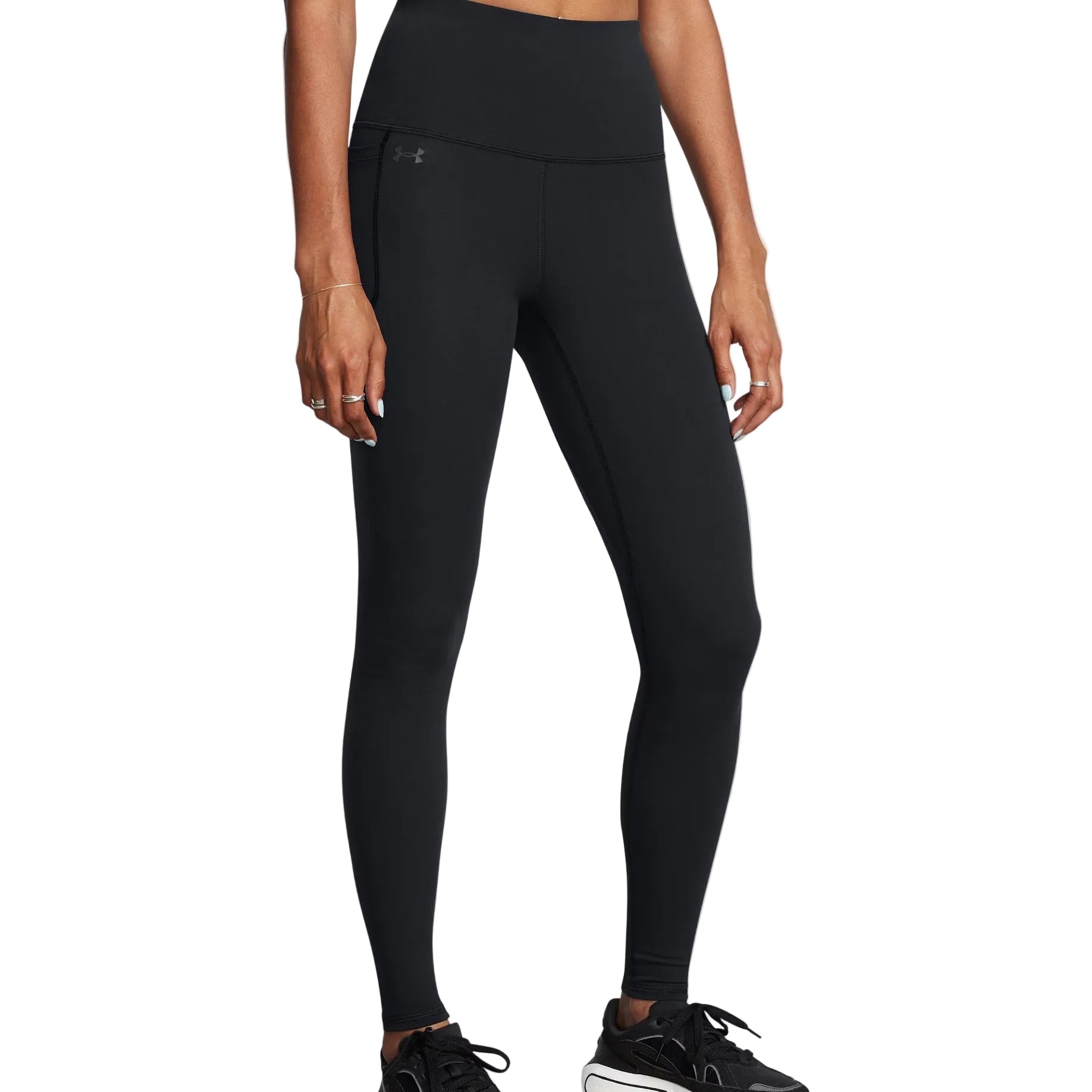 Person wearing black leggings on a white background