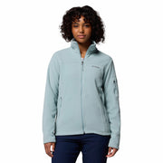 Woman wearing a light blue jacket with Columbia logo on a white background