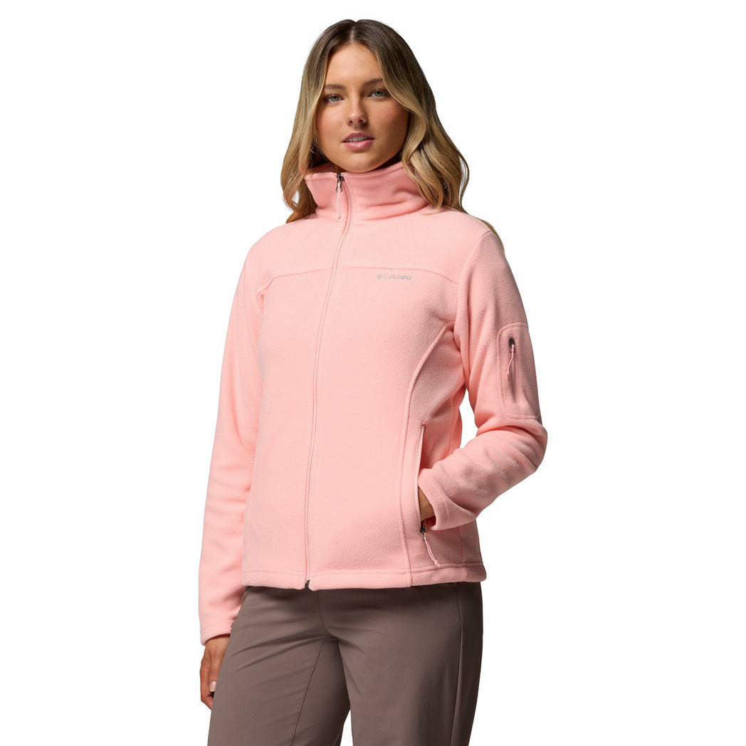 Woman wearing a pink jacket on a white background