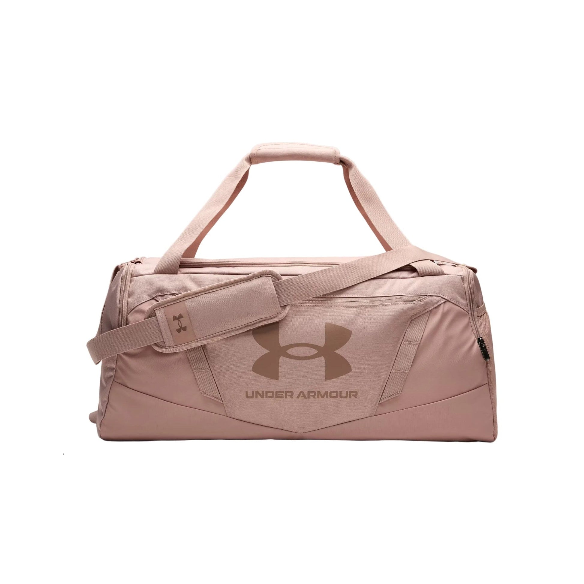 A dusty pink Under Armour duffel bag with a matching adjustable shoulder strap and a tonal logo on the front, set against a plain white background.