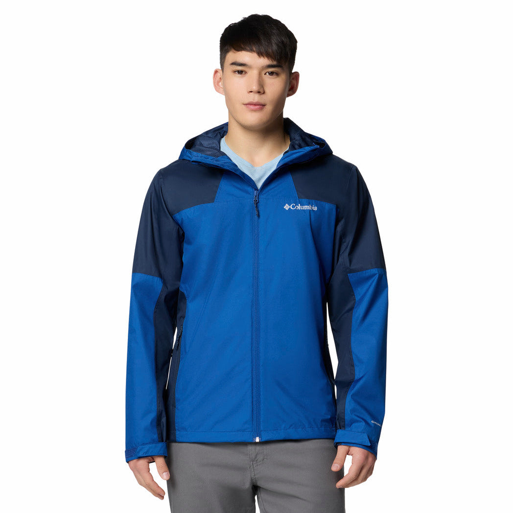 Person wearing a blue and navy jacket with Columbia logo on a white background