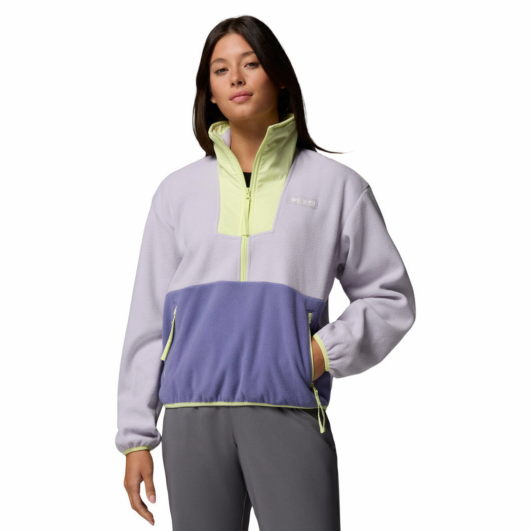 Woman wearing a colorful pullover with a white background