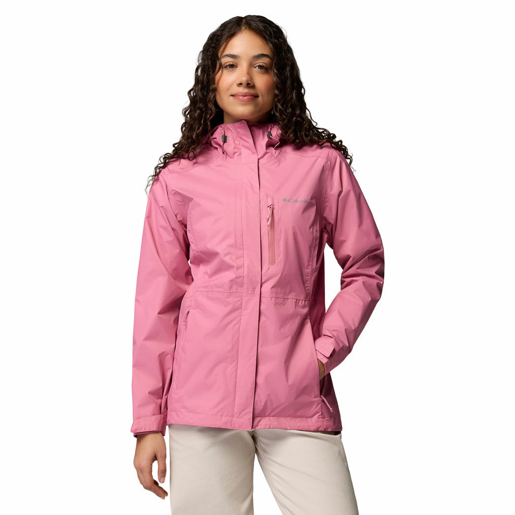 Woman wearing a pink jacket on a white background