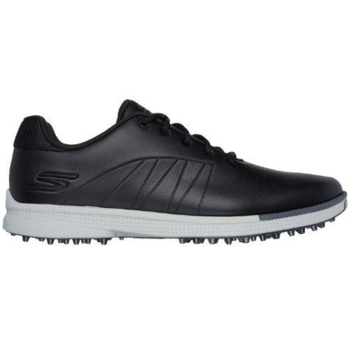 Black golf shoe with white sole on a white background