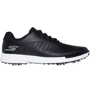 Black golf shoe with white sole on a white background