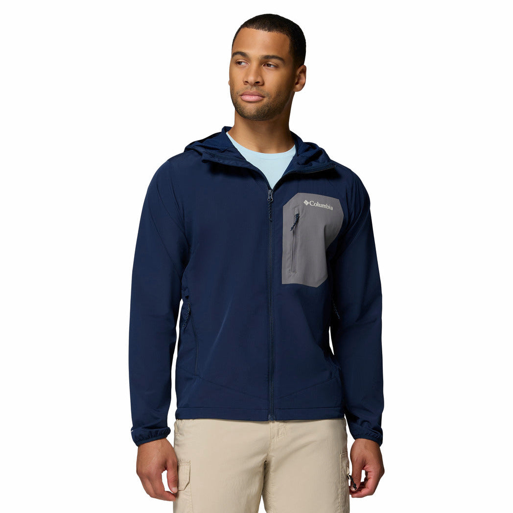 Man wearing a navy blue jacket with a Columbia logo on a white background
