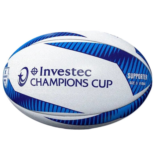 A white rugby ball with blue and navy patterned stripes and the Investec Champions Cup logo, shown on a clean white background.