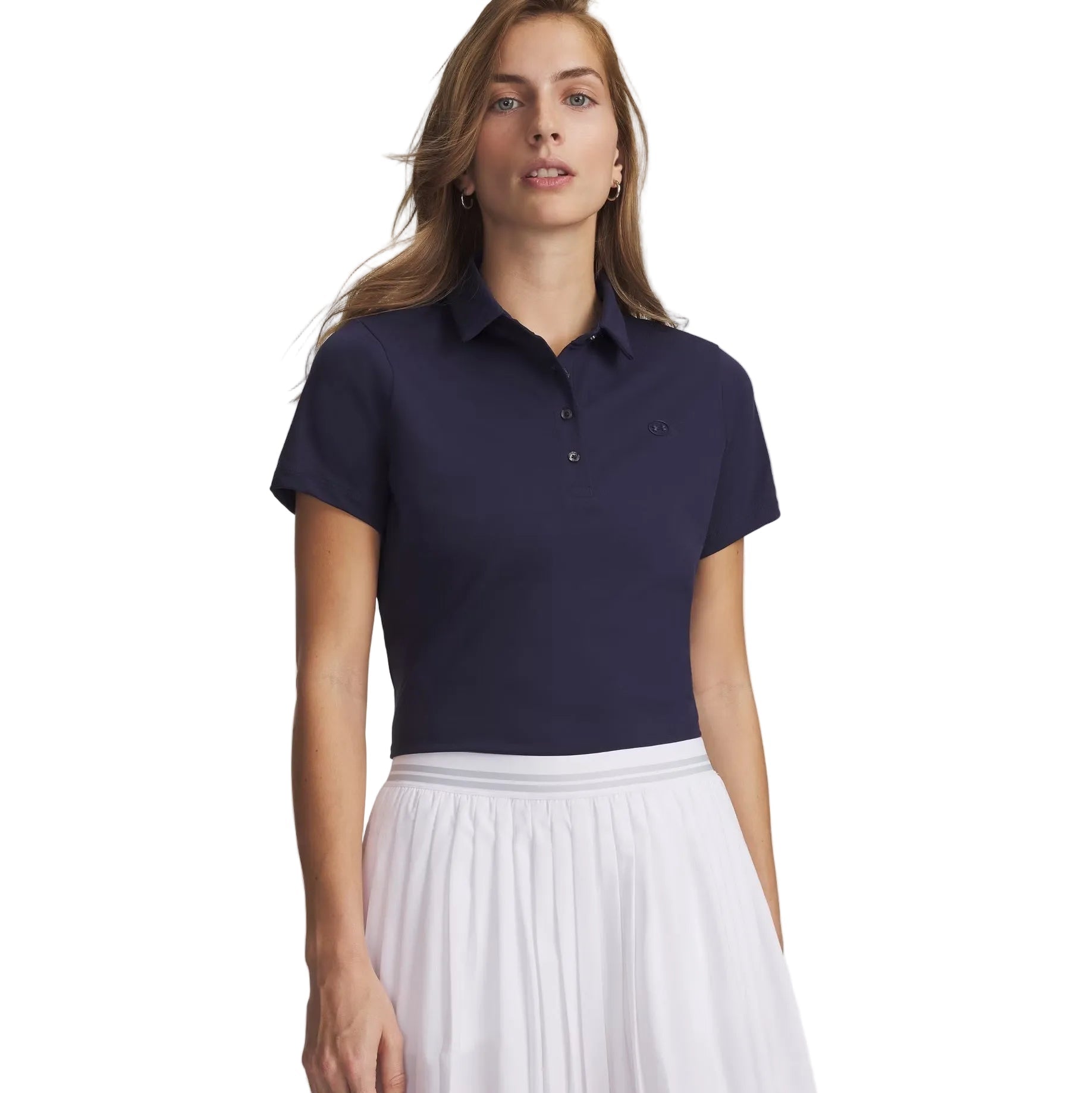 Woman wearing a navy blue polo shirt and white skirt on a light gray background