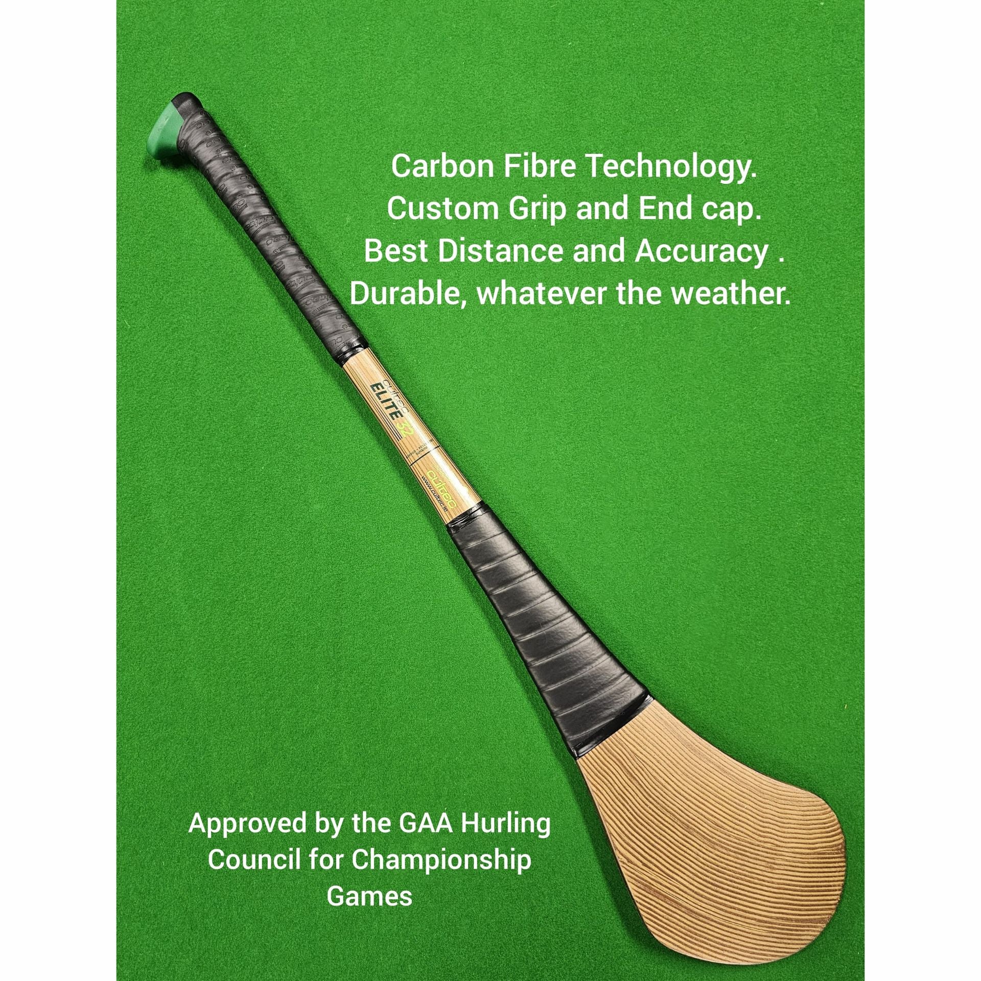 A carbon fibre hurley with a black grip and gold-colored blade, placed diagonally on a green background with white promotional text.