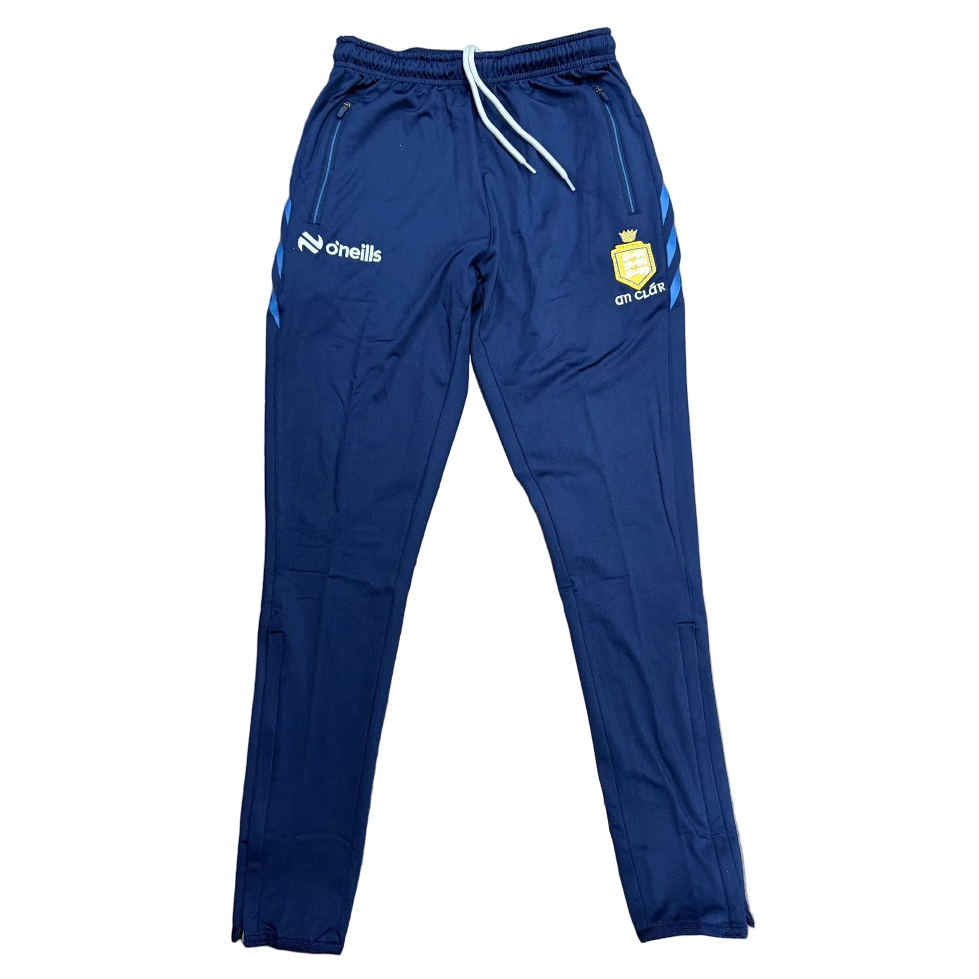 Blue tracksuit pants with a logo on a wooden floor
