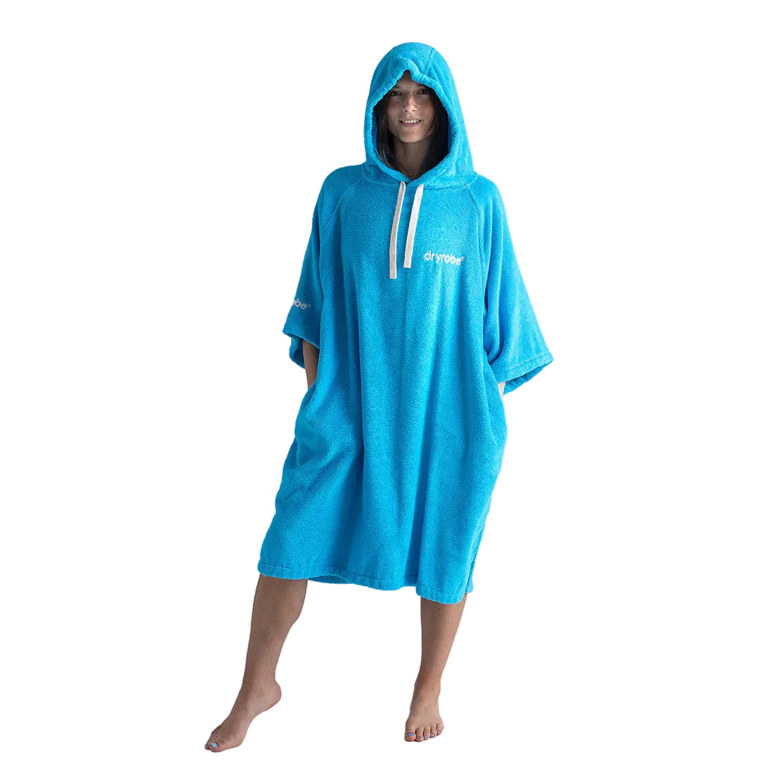 Person wearing a blue hooded towel on a white background