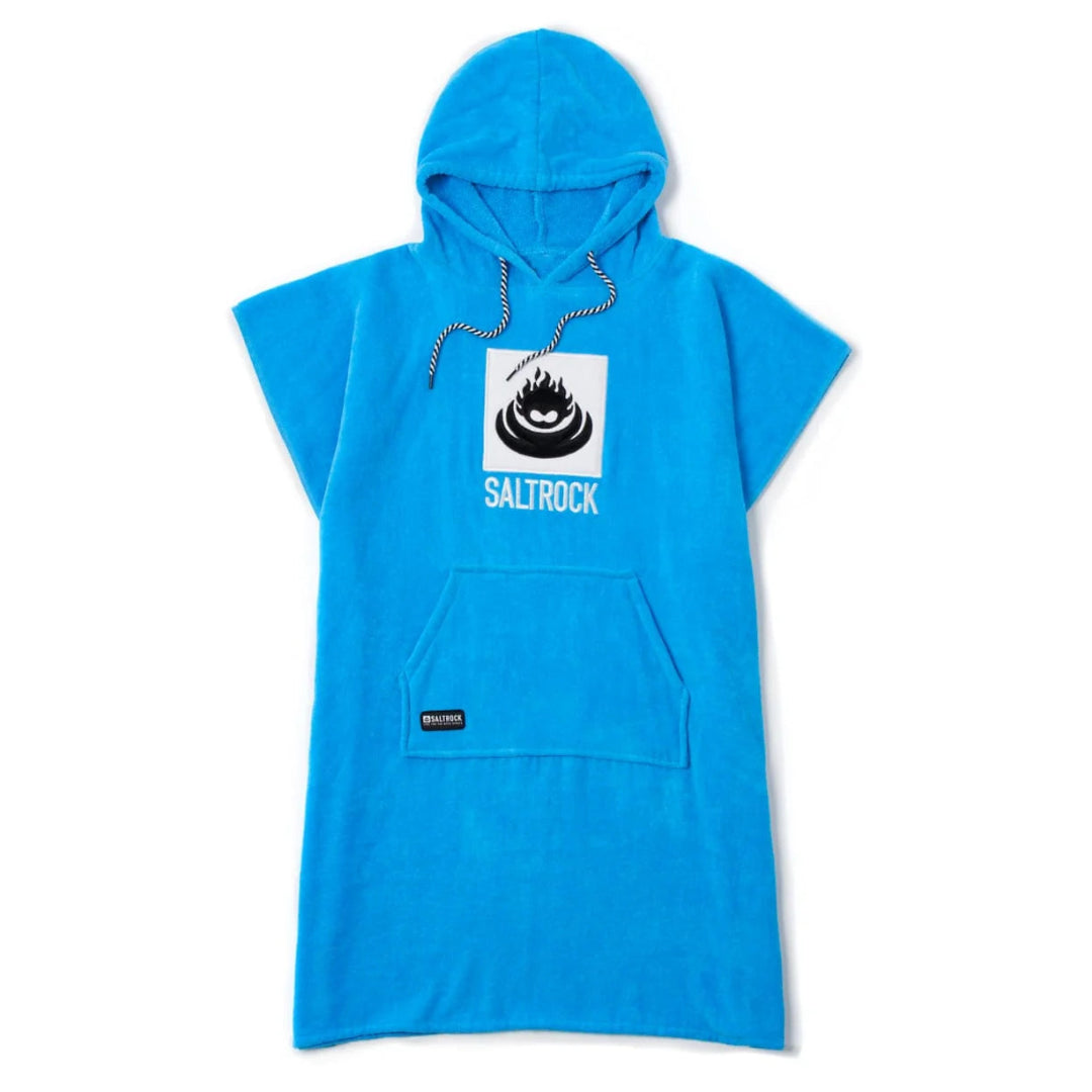 A bright blue hooded towel dress with short sleeves, a kangaroo pocket, and a chest graphic featuring a black flame logo above the text 'SALTROCK' on a white square, shown against a plain white background.