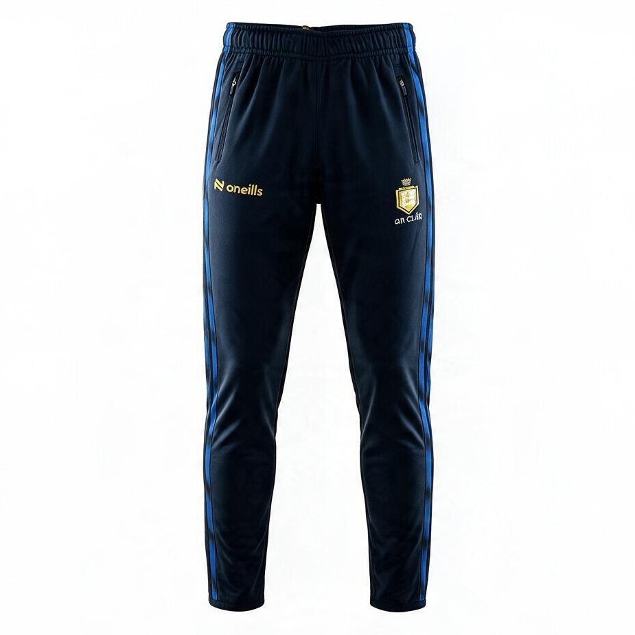 Dark navy blue track pants with blue side stripes, featuring the O'neills logo on the right thigh and the CAA Club crest on the left thigh, shown against a plain white background.