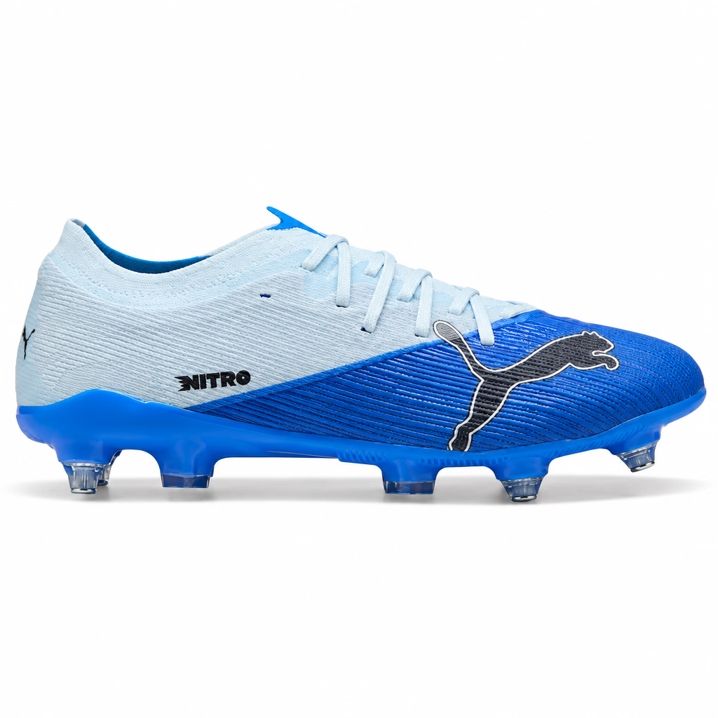 Puma Nitro soccer cleat in blue and light gray, featuring a black Puma cat logo on the side and clear turf studs, shown against a plain white background.