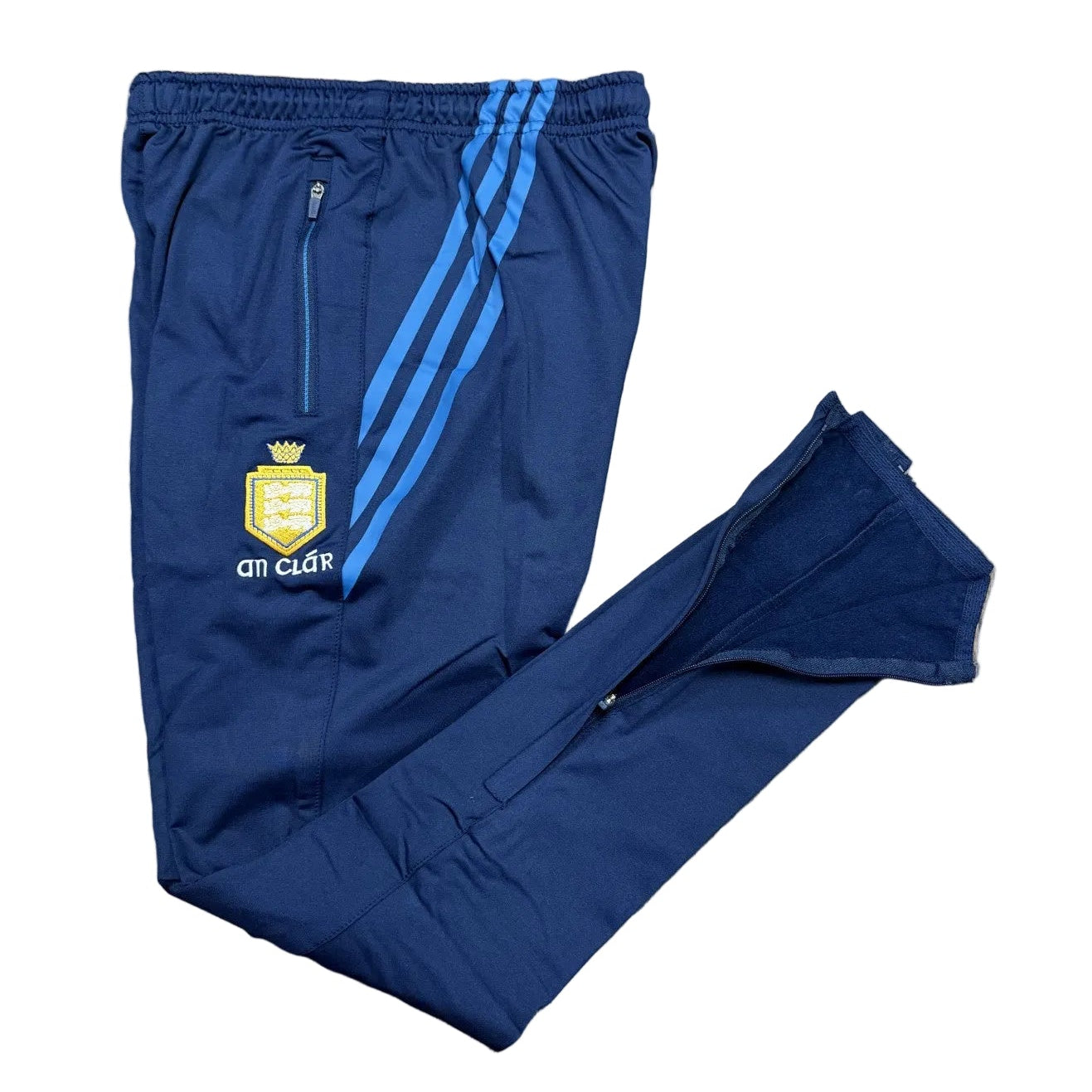 Blue tracksuit with a logo on a wooden floor