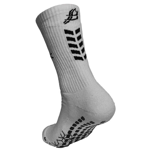 A single white athletic crew sock with black grip patterns and logo details, shown floating against a light gray background.