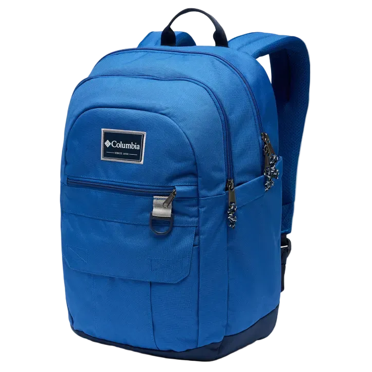 A blue Columbia backpack with multiple zippered compartments and a front logo patch, shown on a plain white background.