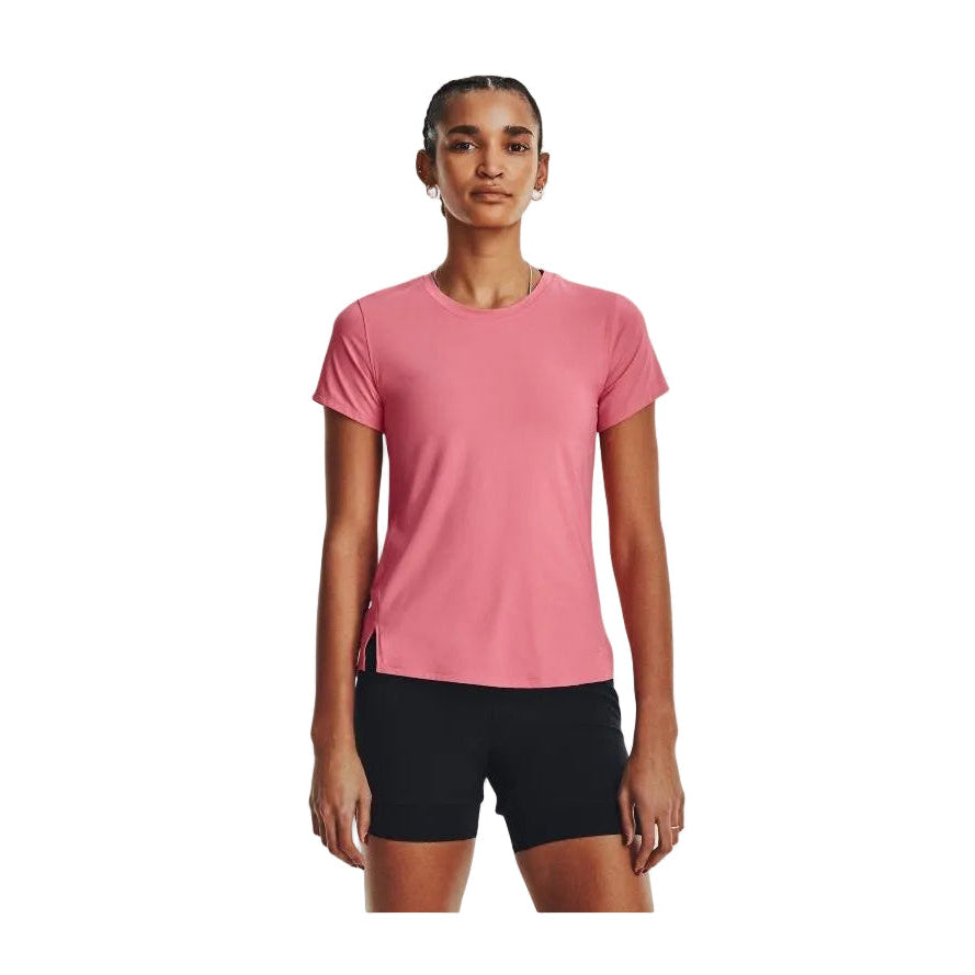 Person wearing a pink athletic shirt and black shorts on a white background