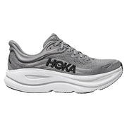 Gray running shoe with white sole on a light gray background