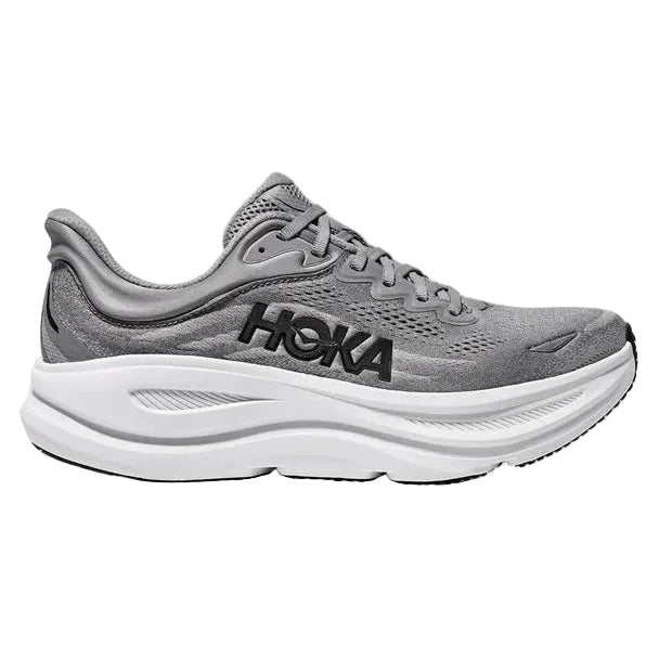 Gray running shoe with white sole on a light gray background