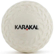 White golf ball with Karakal logo on a white background