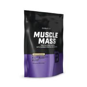 BioTech USA Muscle Mass protein drink powder in a black and purple resealable stand-up pouch, shown on a white background.