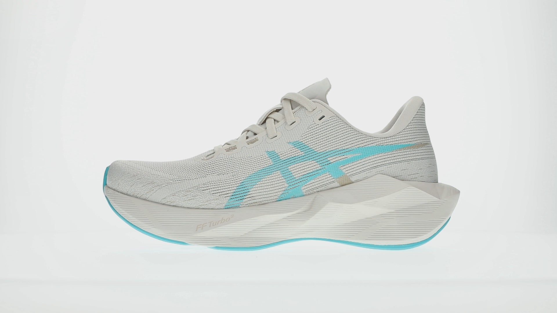 Load video: Asics Novablast 6 Women's Running Shoes Soft Oat Aqua