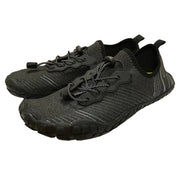 Black and gray shoes with unique sole design on a white background