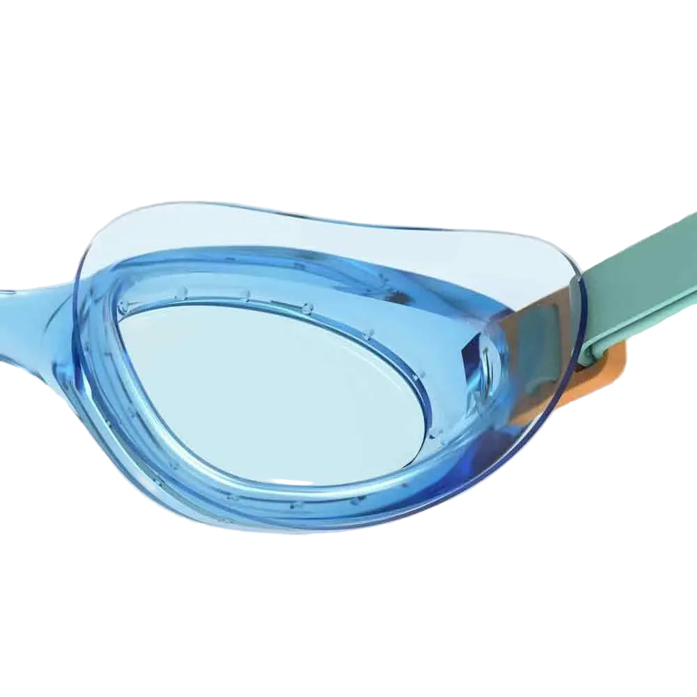 Blue swim goggles on a light gray background