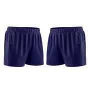 Navy blue shorts with various features labeled on a white background